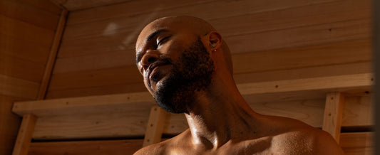 man in a sauna after working out