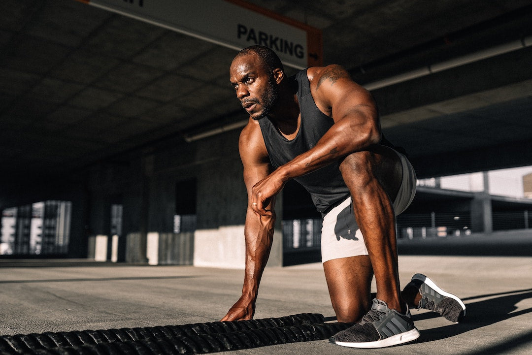 man resting after a workout