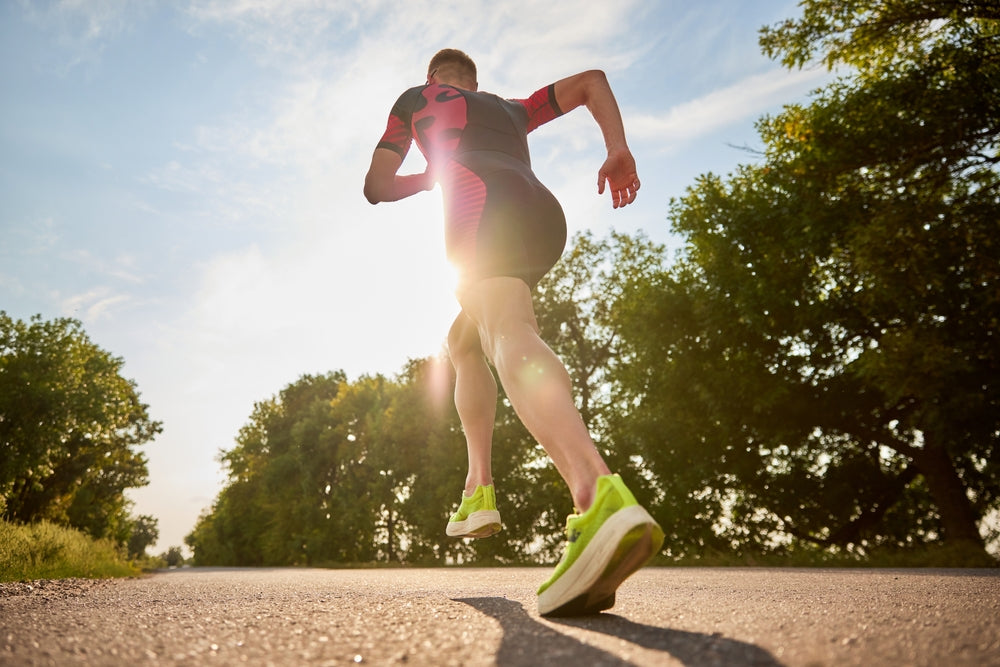 man running in the morning sun