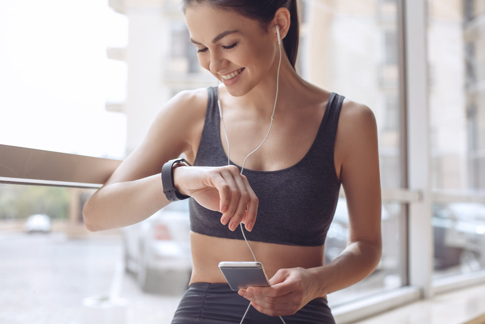 woman looking at watch