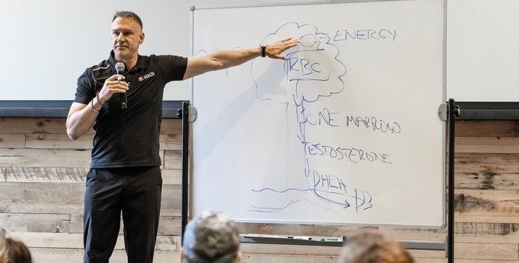 gary brecka speaking at a whiteboard